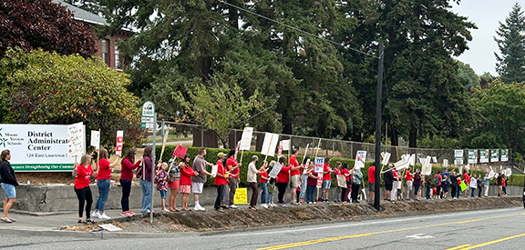 members protesting outsidse the district office